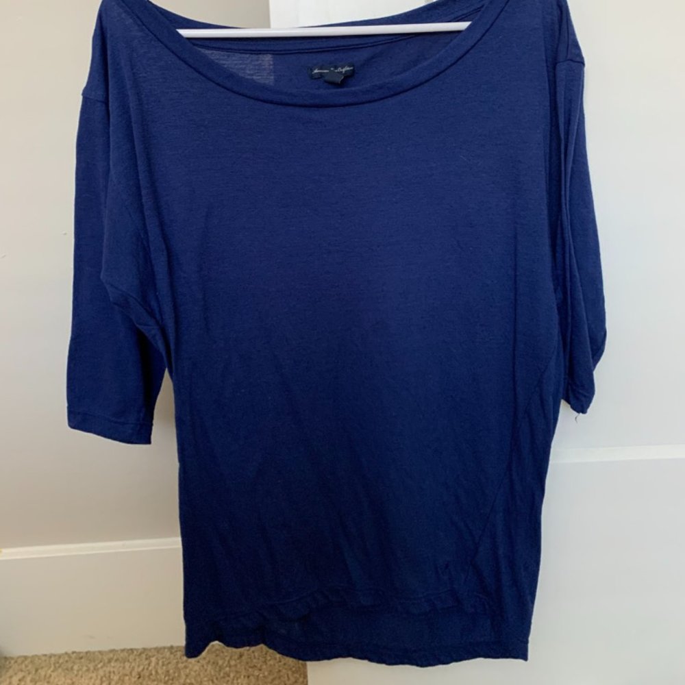 Quarter length sleeve, blue cotton shirt